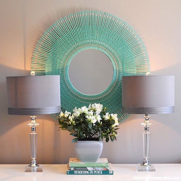  DIY Aquamarine Sunburst mirror. This is another idea about DIY mirrored wall art. You can create different ones with beads in any color as you like. 