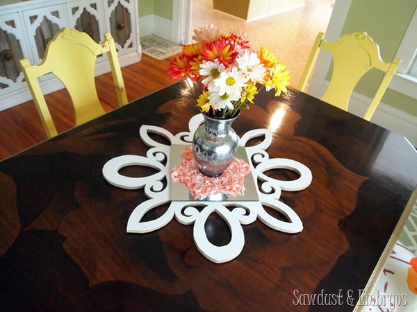  DIY Scalloped and Mirrored Table Centerpiece. If you are a fan of scroll saw projects, this fantastic mirrored table centerpiece will be a must-have accessory to make for your living room. 