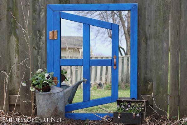  Mirrored door in a garden. Mirrors are a wonderful addition to a garden. Not only does it bring more light to the very dark area, but it gave the illusion of more garden in the distance. It is quite mesmerizing. 