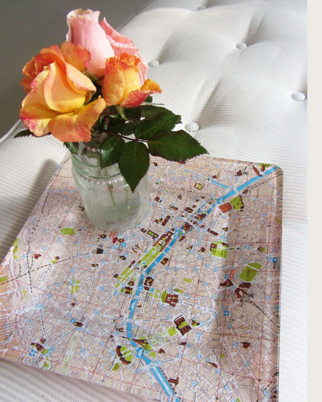 Map Serving Tray. Spread layer of decoupage medium on the glass plate and glue the paper map at the bottom. In this way, the map pattern is visible through the glass. This tray must be a focal point on your party.