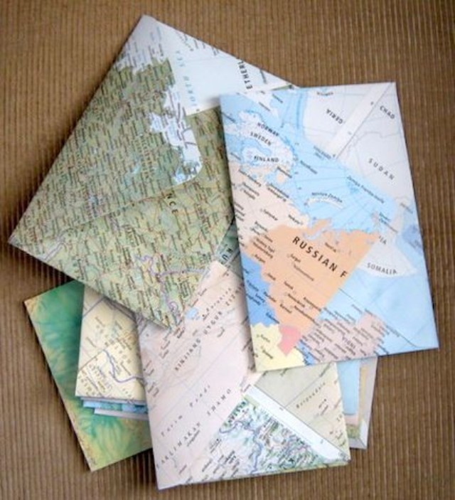Map Patterned Envelope Art. Use the open envelope as the template to cut the shape from the map paper. Fold it in the same place as the original one and glue together. It's super chic to turn the dreary map page into this lively and cool map patterned envelope.