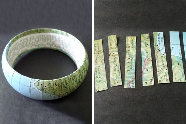 Vintage Map Bangle. Cut maps into strips, line them up and make the edges overlap, glue them on the bracelet and you can glue something unexpected on the inside to finish off this interesting vintage map bangle.