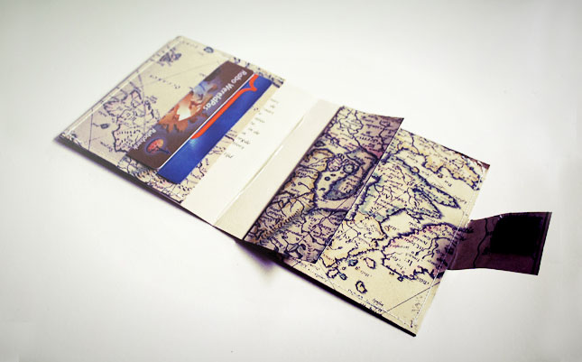 Map Wallet. Sew map paper along the outside of the wallet to secure, use adhesive Velcro and put it on the closing of the wallet and the little pocket inside to secure. You've got the whole world in your hands with this nifty work of art.