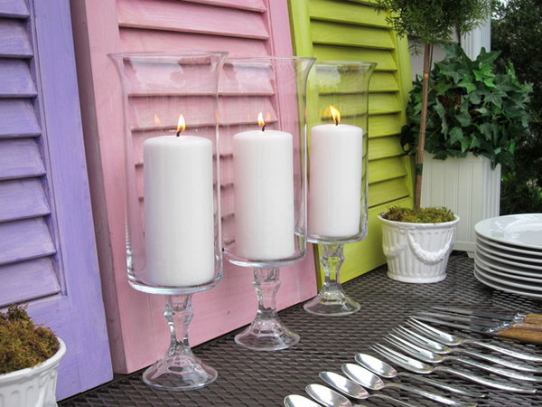 DIY Beautiful Candle Holders. The glass candlesticks can create so many creative crafts. This time, they are paired with glass vases to make beautiful candle holders. You can also paint any color to match your decor. 