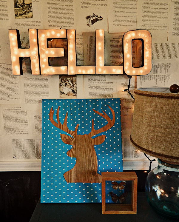 Cover the tape on the cardboard, tape the twinkle lights, wrap twinkle lights around and hang the sign. It's so great to decorate girls' dorm room in this dreamy illumination decor.