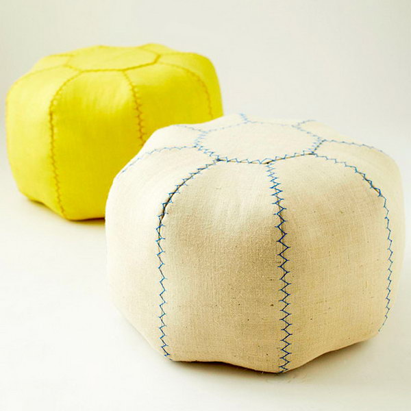 Sew This DIY Pouf. Cut the pieces and stitch the sets, press the seams, join the pairs, put all haves together, fill all fabrics inside for the pouf, baste top and bottom pieces, add the decorative stitch to finish this pouf off for your fantastic dorm room decor for girls.