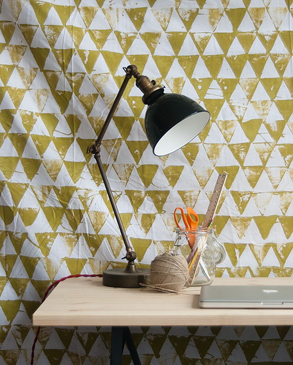 Geometric Wall Hanging. Lay plastic tarp below the sheet, dip the surface of triangle bock into the paint to print the patterns on to your color. It's so great to recreate your space in this fashionable way.