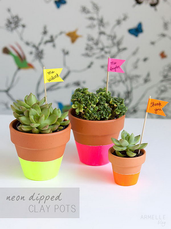 Dipped Succulent Pots. Tape around the entire pot, paint the pot, once it is dry, let the pot dry and plant your fresh plant to add the natural flavor for your dorm room.