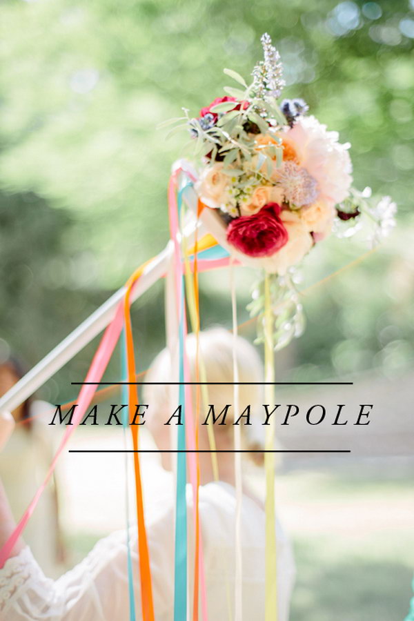 Maypole. Spray paint and add some glue on the top of the metal circle, add flowers and colorful ribbons to create the wonderful artistic floral decor for May.