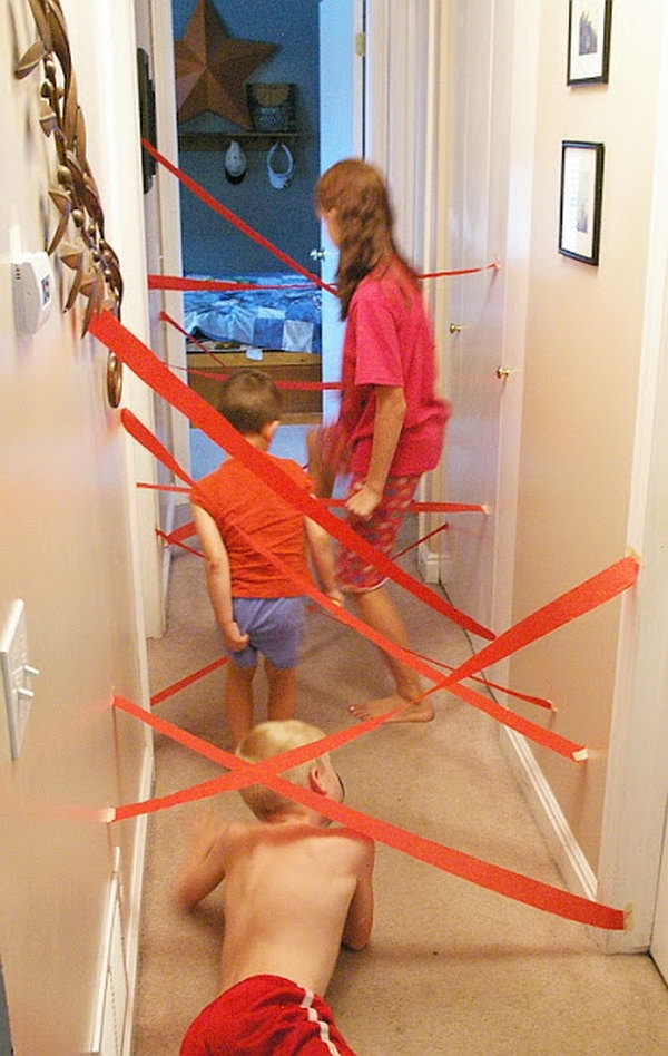 DIY Lazer Maze Kids Activity. You just need some a roll of crepe paper and some  masking tape.   Your kids  will go crazy designing mazes and working their own way through them. Learn more here.