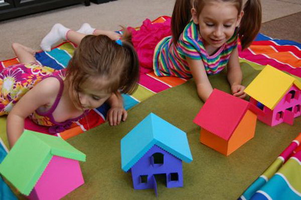 Build  Rainbow Village. Use your free colorful cardstocks to make this rainbow village. Use bits of velcro to hold the houses together. Your kids can  build and re-build the rainbow village over and over again with different color combinations. Learn more here.