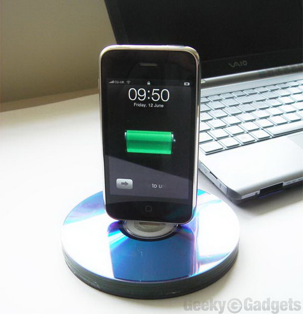 Recycled CD iPhone Dock. Align all the cuts out and insert the charging connector into the stacked disks. Glue the cable channel disks to make this charging end pass right through but as a tight fit. You must enjoy the beautiful display of your device with low budget.