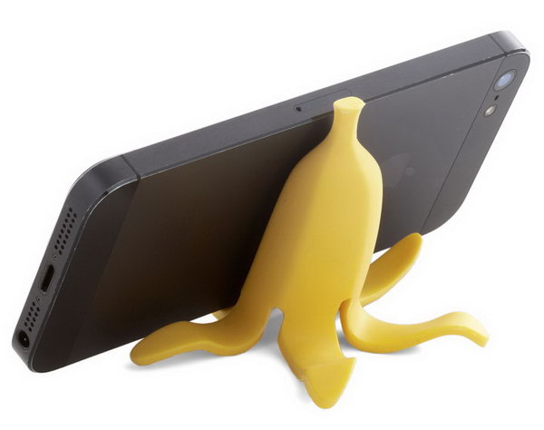 Banana Appeal iPhone Stand. It's super chic to display your iPone or other devices from slipping off your desk with this banana peel iPhone stand. It features bright yellow peels and notched front to prop up your iPhone reliably.