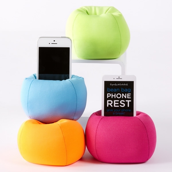 Bean Bag iPhone Stand. As its name suggests, this iPhone stand features a comfy bean bag to display your device in bright color.