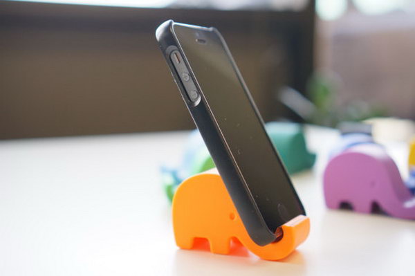 Cute Elephant iPhone Stand. As its name suggests, this stand features an adorable elephant iPhone stand to display your device in a funny way.