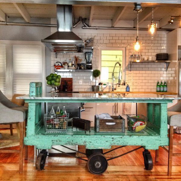 Vintage Factory Cart. Movable green vintage island here is absolutely a great way to pop the whole space. And the  cast is really a separate serving space that allows you to -entertain with drinks.