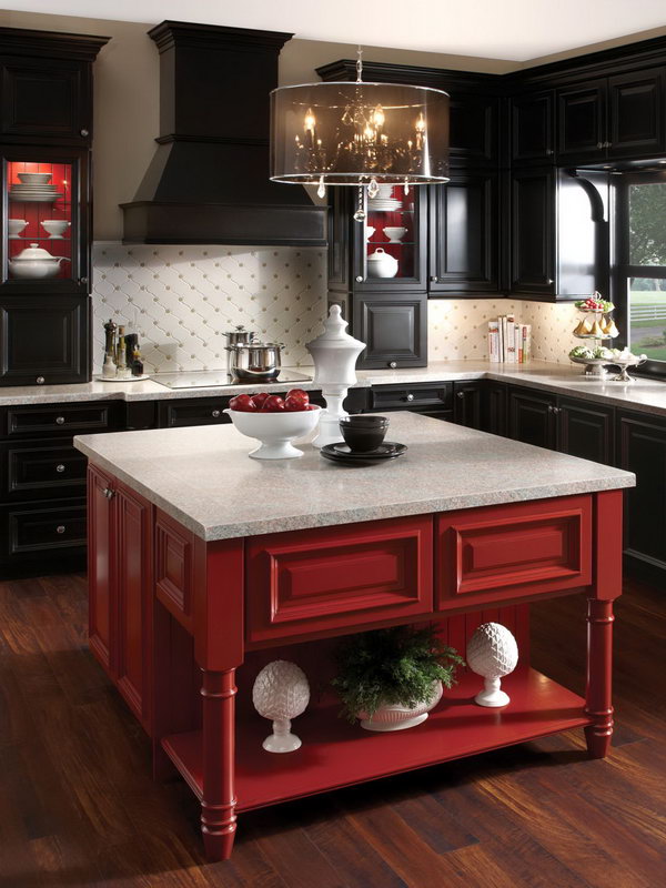 Black with a Pop of Red. Black cabinetry has been so hot, but  so much black can feel heavy and dark. Buoy it with a shot of brilliant color, such as the red on this kitchen island. 