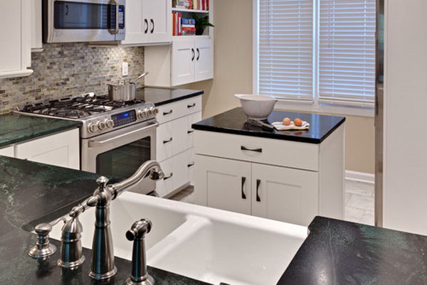  Black and white compact kitchen island. In this small kitchen, an extra island is worthy for the storage and prep space.  And it also adds to stylish feeling. Love it.