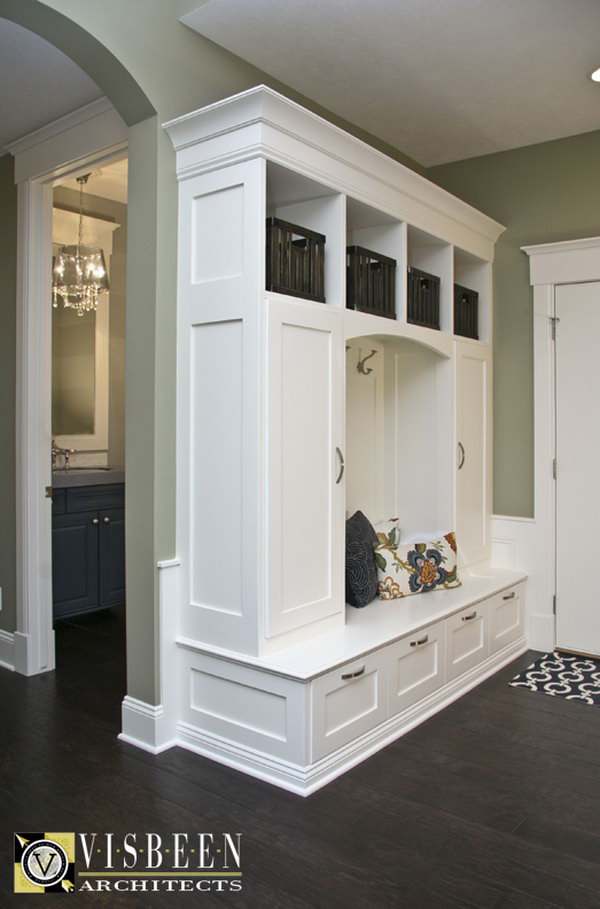  Love this mudroom area! This mudroom behind the front door with built ins to put your shoes and other stuff in is really worthy to have. Also love the color palette.