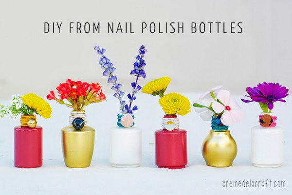 DIY Mini polish bottle vases. This is the perfect way to recycle old nail polish bottles you have lying around. These mini polish bottle vases are the amazing addition to your living room. 