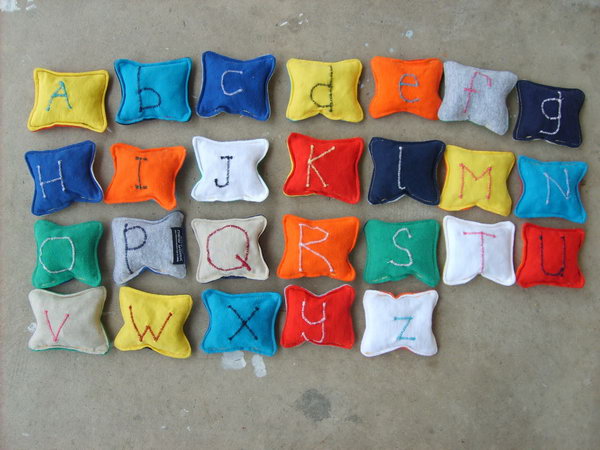 Recycled T-shirt Alphabet Beanbags. Make these fun and colorful alphabet beanbags by using old T-shirt. Your little ones will love them very much, and it will also be easier and more fun to learn 26 letters for your kids. 