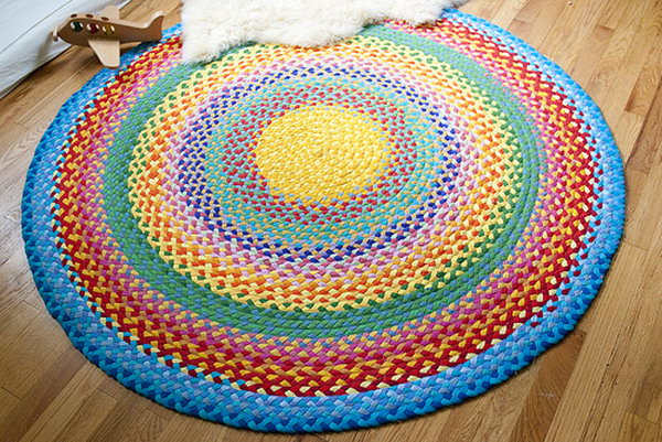 Braided Rainbow Rug with Old T-shirt. This braided rainbow rug looks great in the play room.but it is not an easy project.If you have enough time and patience, you can have a try. 