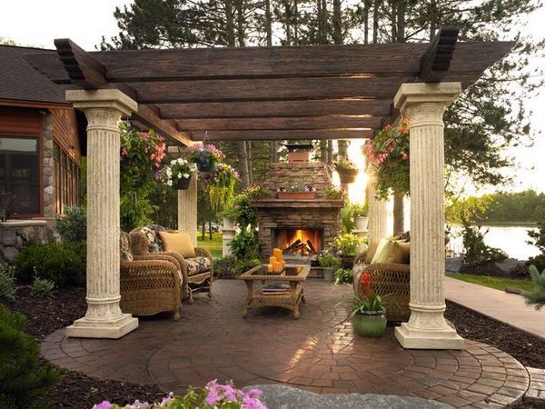 The traditional brick fireplace and the pergola made from wood are really nature-friendly. It's not only a cooking place but also a nice comfortable seating area. 