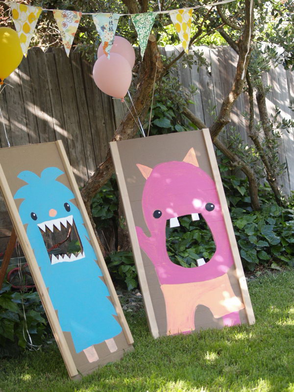 Monster Bean Bag Toss. Make big monster out of cardboard. They doubled as a bean bag toss game as well as a picture taking backdrop. The kids must enjoy this game very much to cool off and have a lot of fun in summer.