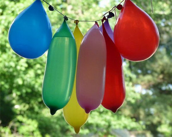 Water Balloon Pinata. String up large balloon to create the water balloon pi?atas.  Ask kids to take turns swatting at them on a hot day. The kids can cool off with the downpour of water and have a lot of fun.