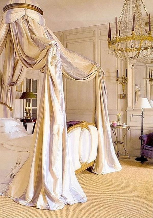 Breathtaking Master Bedroom: The soft lavender striped crown canopy, the perfectly ornate chandelier and elegant wood-panelled walls, the scallop-trim linens and luxurious gilded bed — so many beautiful details 