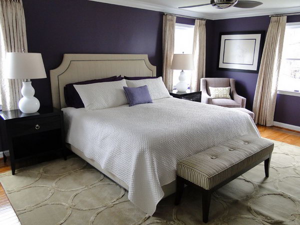 Purple-blue and White Deco Bedroom: I love how they pair plethora of dark purple with warm neutrals and light for some contrast. The black furniture  really pops the white lamps and other items around it.