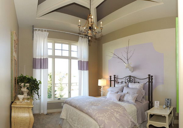 Create an Illusion: In a bedroom without large floor-to-ceiling windows, here's an example of how you can introduce your favorite purple in and make the space visually spread. I love the way nature touches the room in modern, and the whimsical ways with the lamp, and the deer head.  