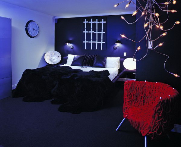 Create Drama: In this deep purple bedroom for a 16 yr old boy which could be for any age man, black is used on the bed wall to create drama. Every room should have a 'surprise' or a fabulous peice of furniture. 