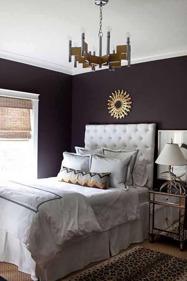  Deep purple wall: The deep color speaks volumes in this simple, yet elegantly-styled room!