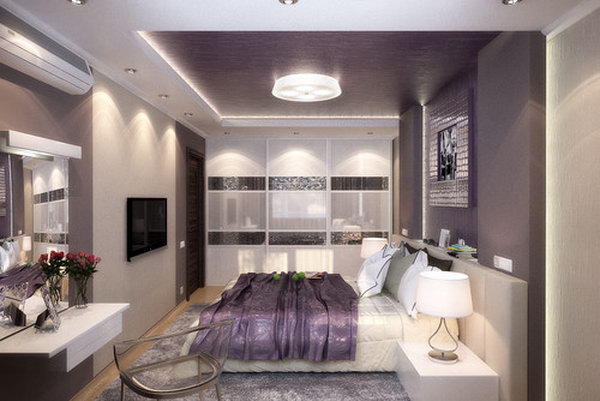 Trendy Silver and Lilac: It's bold way to paint the  back wall and ceiling all in purple  as sometimes it'll give your space a strong, dark look. But this bedroom looks bright and elegant with doses of white and the cheering up of silver. Love the idea different materials to scream the romance of purple. 