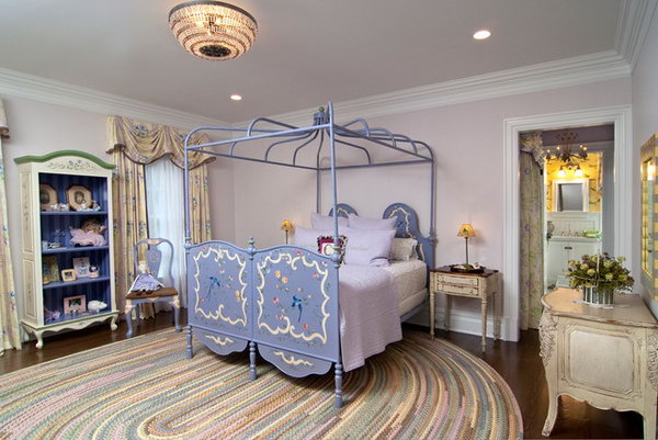 Country French Bedroom: Every single detail of this bedroom is great. I love the pastel color scheme, the canopy, the rug, the French furnishing and the curtain. They work well to feature a dreamy girl's bedroom.