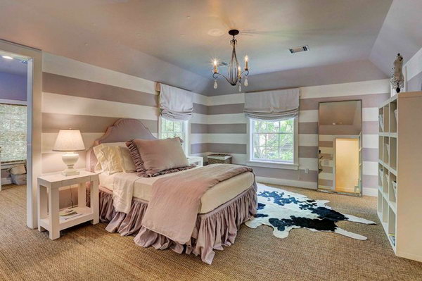 Purple and White Striped Bedroom: With the soft color seagrass carpets and chandelier, the purple and white striped bedroom looks both shabby chic and cool. 