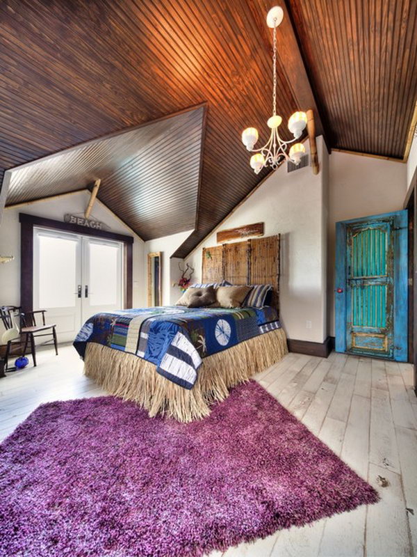 Purple Rug: In this spectacular eclectic master bedroom, the ceiling, the fuschia, turquoise, browns and tans all pair so well with one another! Love the door, rug, ceiling and the room layout!