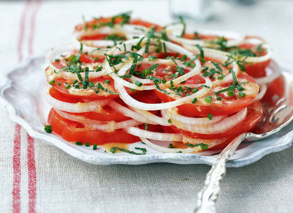 Creole Tomato Salad. Tomatoes are an important ingredient in the summer salad recipes. This simple no-cook and composed salad  is easy to put together with  raw onion and vinaigrette.