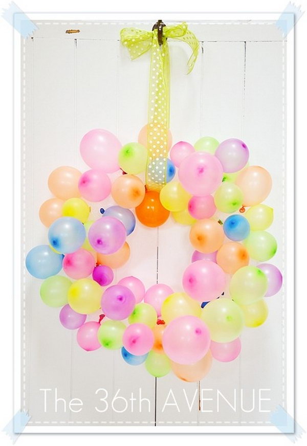 Summer Balloon Wreath. Every kid loves balloons. You can get this idea for your little ones to make a beautiful balloon wreath during the summer.