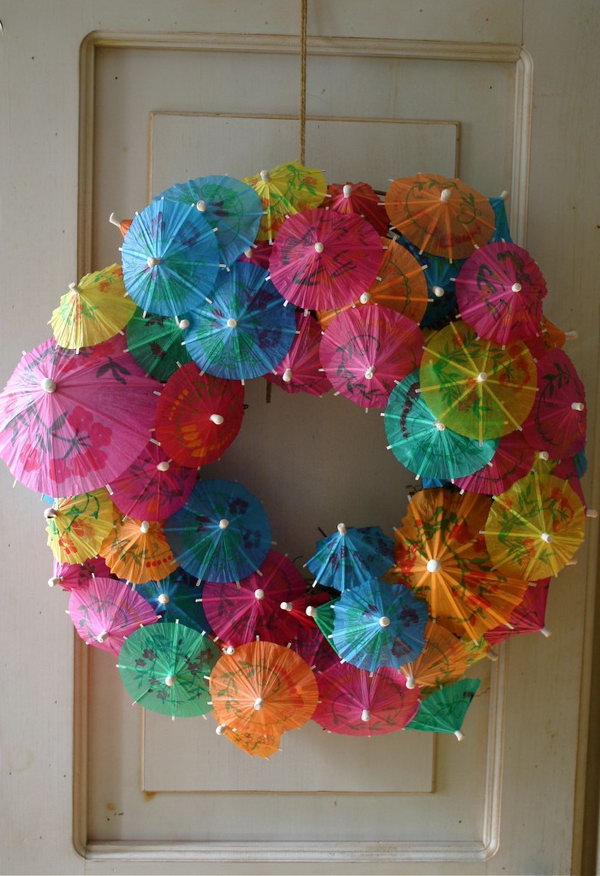Paper Umbrella Wreath. Paper cocktail parasols or umbrellas are available at party supply stores. You can collect them and make this craft. It looks so wonderful in your kids' door.
