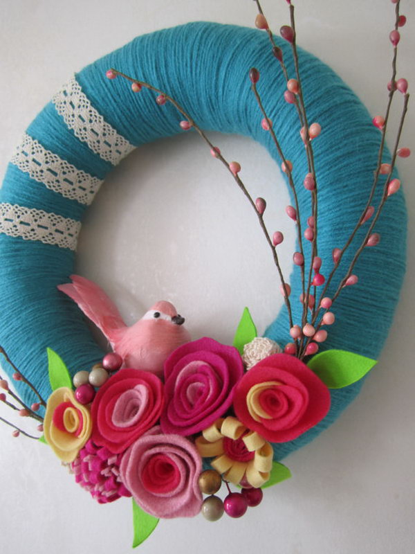Pink Bird Teal Yarn Wreath. This bird teal yarn wreath is super beautiful and adorable. It is the favorite of most girls. It is a perfect decor of your daughter' room. 
