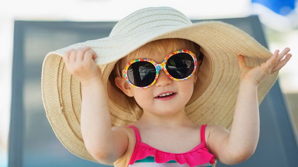  Sunglass and Hat. Kids are more susceptible to retinal damage than adults. It's more important to protect eyes for kids.  So encourage your kids to rock a hat and sunglasses every time they go outside.  