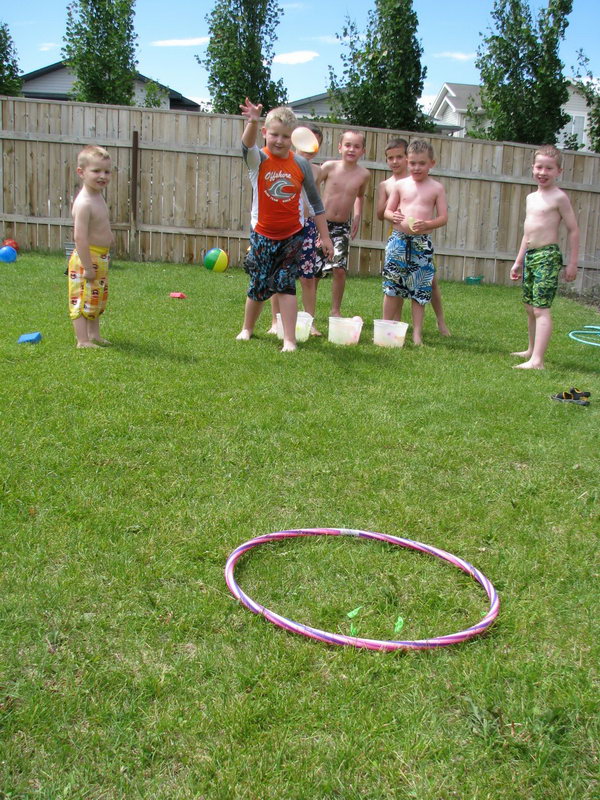 Water Balloon Target Toss. Pull out the hula-hoop and toss your water balloons at the target. You can group the players and count how many each team hits the target to raise the team spirit for kids in this funny game.
