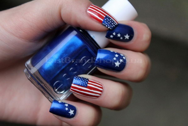 Classic Stars and Stripes Nail Art: What makes this classic stars and stripes manicure look textural and fancy is the electro opt blue they used and the length of the nails. I am forever trying to get my nails the same length so I can try something cool like this. 
