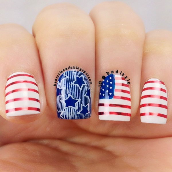American Flag inspired Short Nails: This July 4th Nail is a clean, fancy way to rock your country's colors. Show off your patriotic pride with this America flag nail. 
