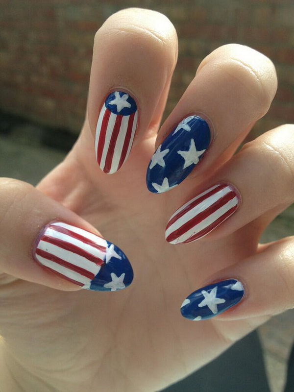Classic Flag Stiletto Nails Design: When in doubt, try not to be discouraged. Go for a classic flag design just like these talon like nails. They are surely to rock your look.  