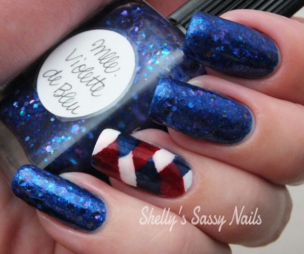 Patriotci Stripes White Blue and Red Nail Art: This is just a fun and different design to show some love on the Fourth of July. See the tutorial here.