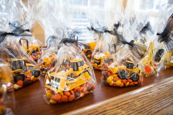 Workbench Dessert Table: When it's time for your guests to leave, the goodie bag with a truck in it will be a great gift. 