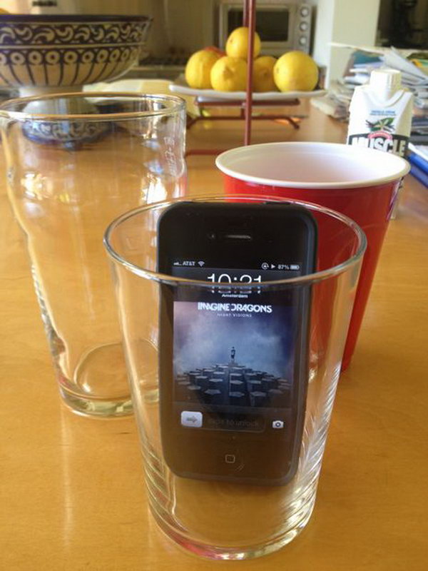 Glass iPhone Speaker: Put your phone in a glass to make the music loud enough to fill the room. So simple and clever way. See the tutorial 